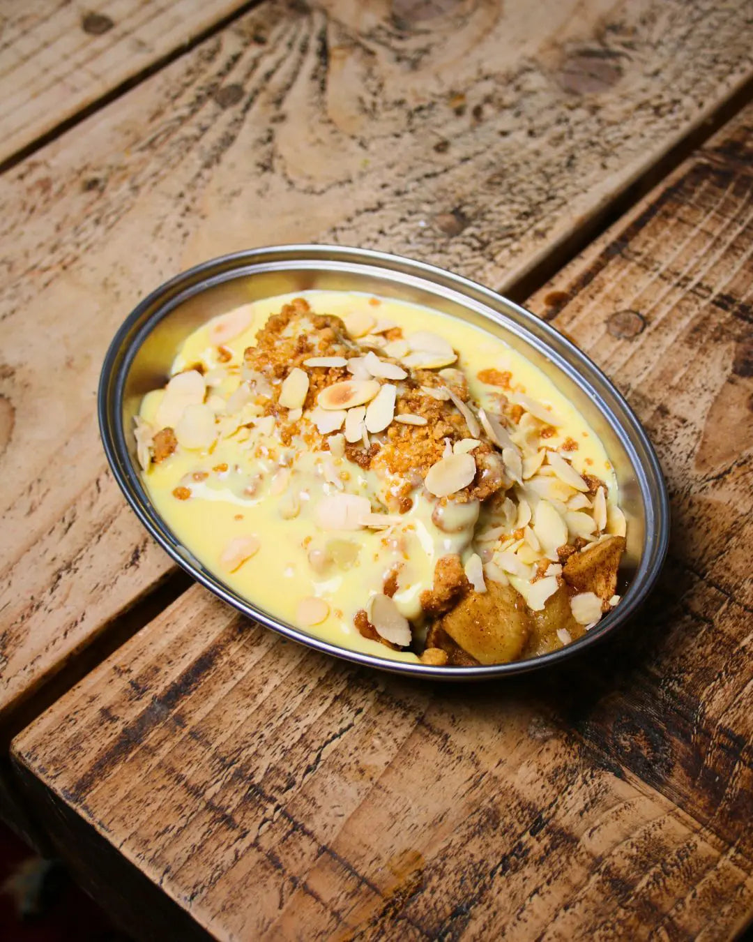Apple Crumble and Custard at Dear Diana – homemade apple crumble with flaked almonds and warm custard